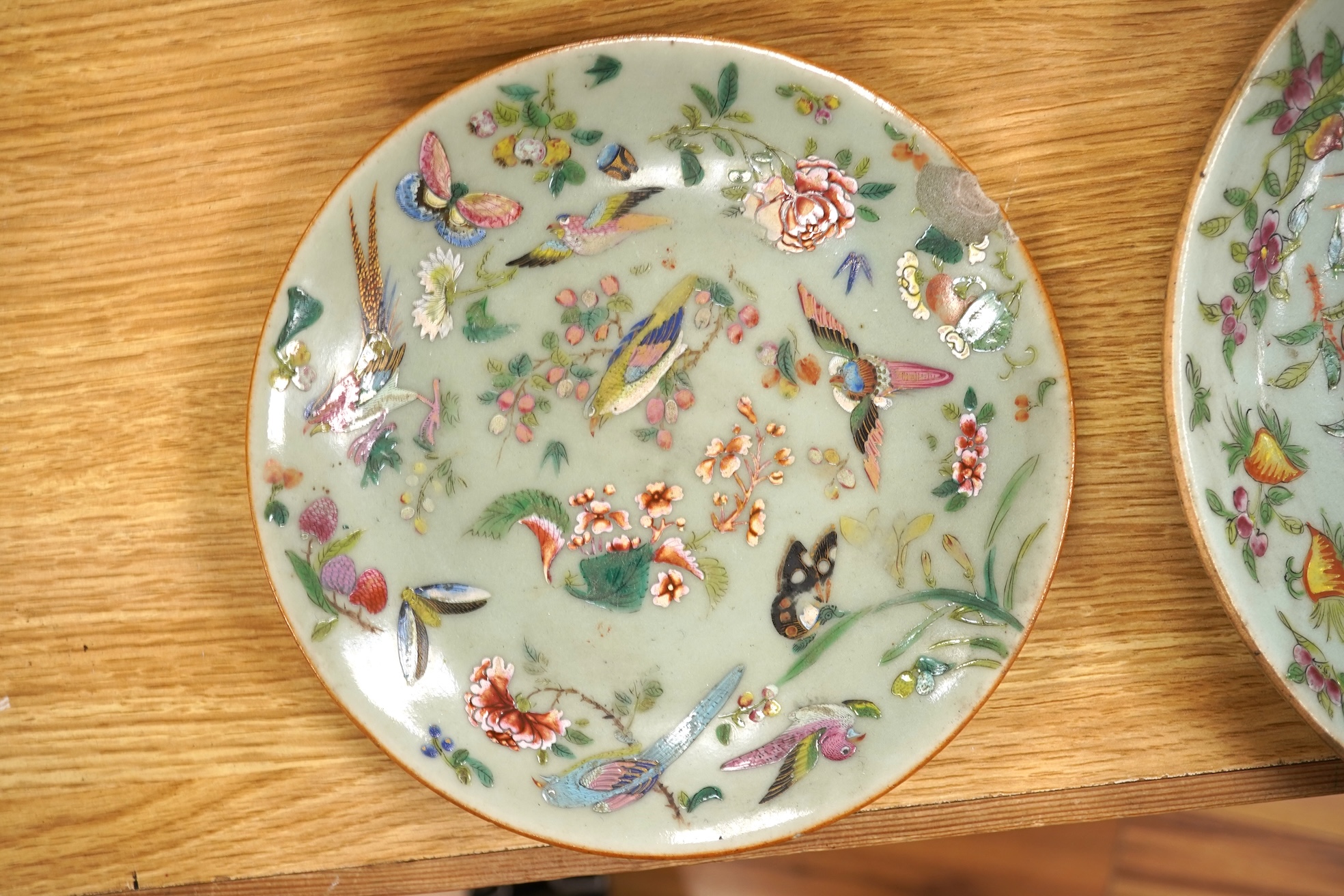 Four 19th century Chinese famille rose celadon ground dishes, largest 25cm
